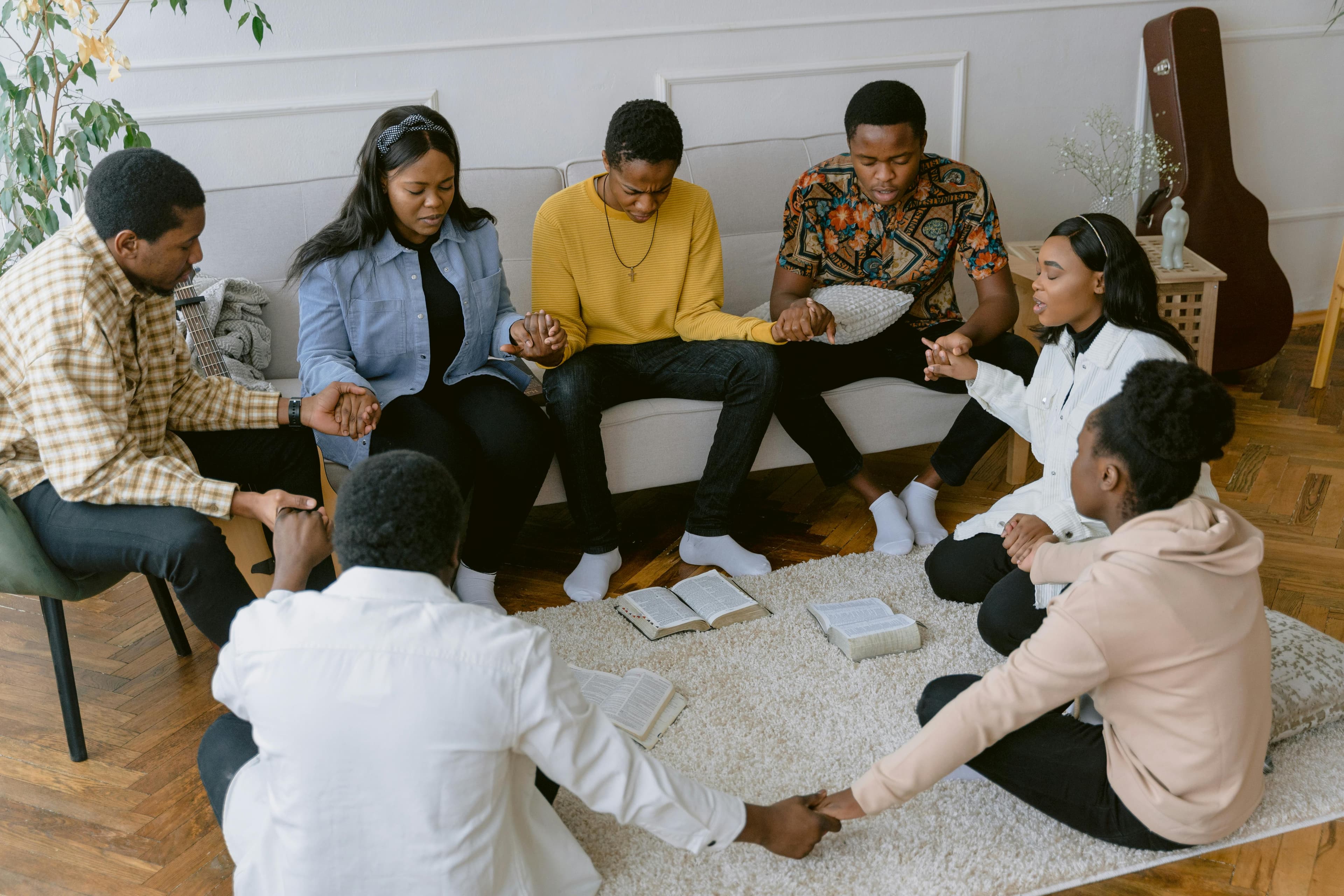 People praying together in community